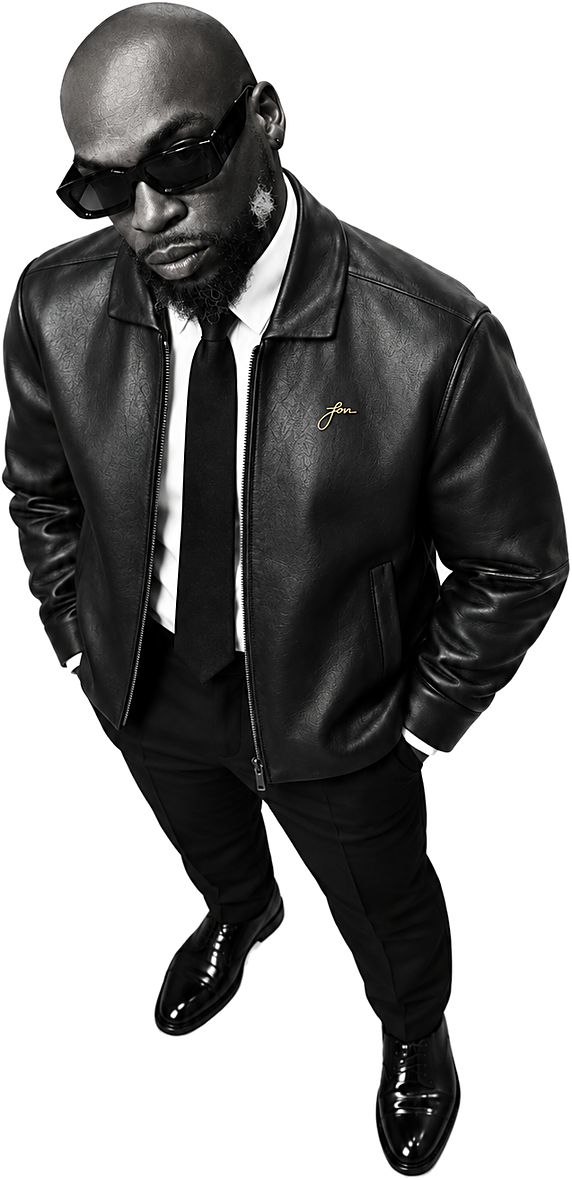 Lorrell Gold in a black suit, photographed from above